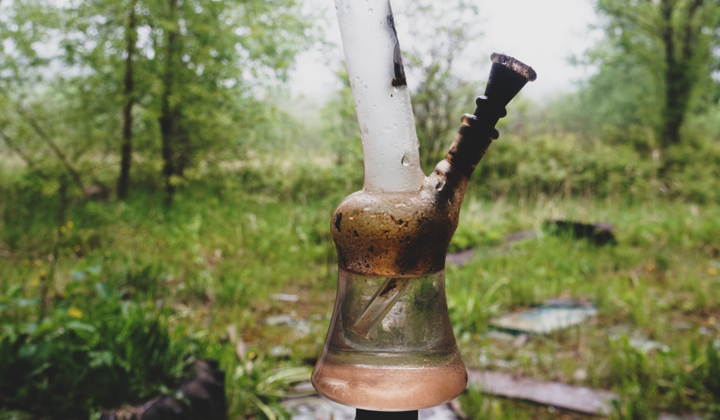 A dirty bong in the woods