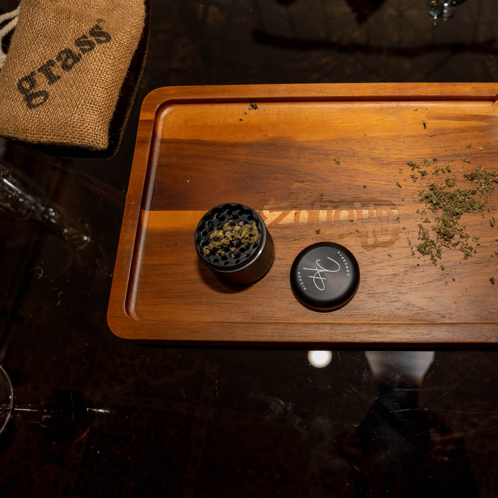 Higher Concepts 4-Part Aluminium Grinder 55mm on a rolling tray