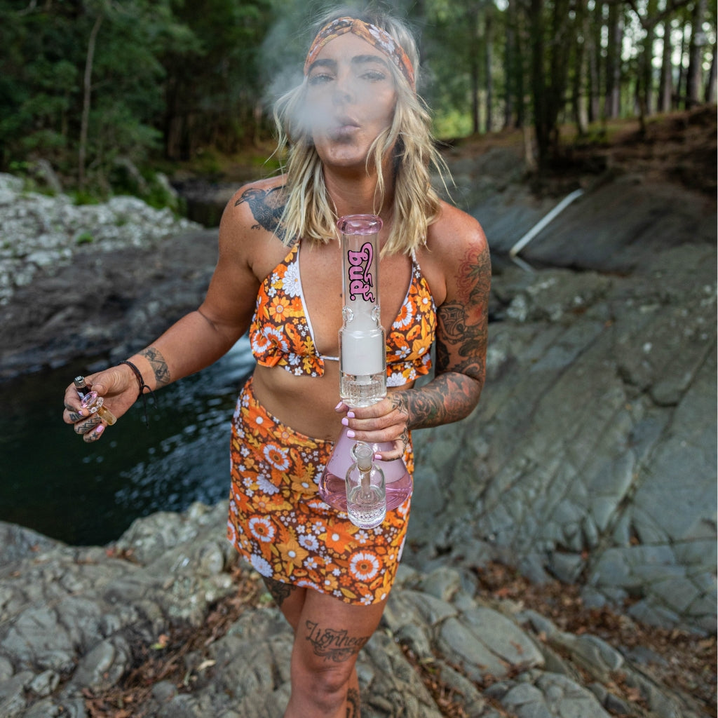 Woman exhaling from Bud Matrix Percolator Bong 40cm Pink