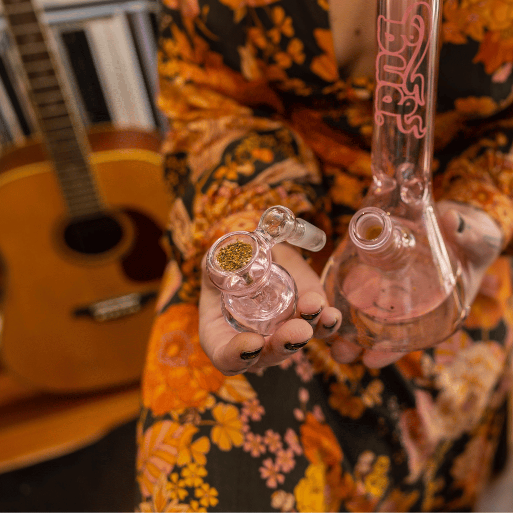 Woman holding pink Bulb Ash Catcher